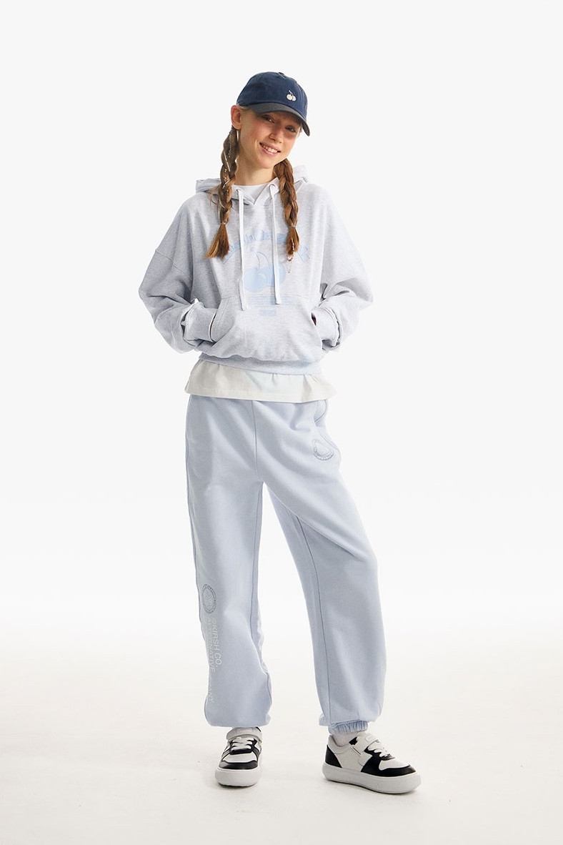 ★2023FW新作★KIRSH★DOODLE CHERRY CIRCLE LOGO JOGGER PANTS KIRSH Doodle Cherry Circle Logo Jogger Pants Sky | Joggers