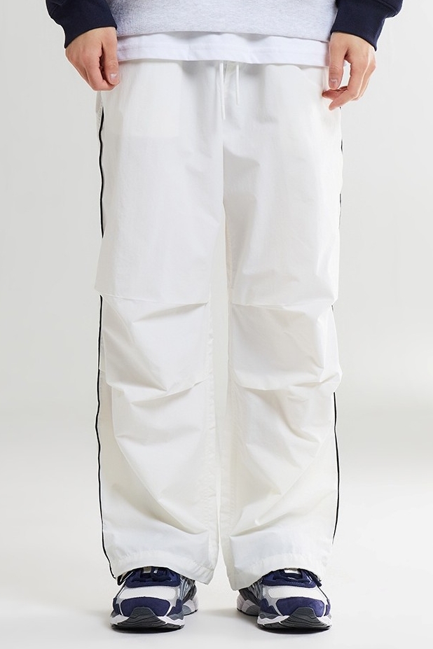 SPAO Unisex Flower Piping Parachute Wide Pants | Wide for