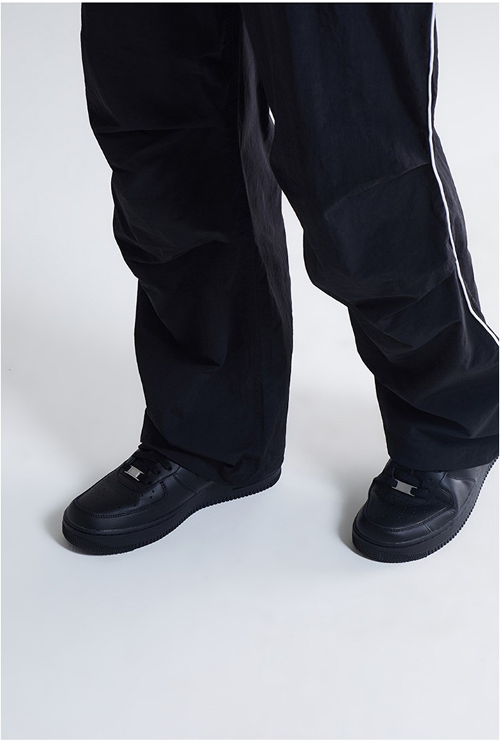 SPAO Unisex Flower Piping Parachute Wide Pants | Wide for
